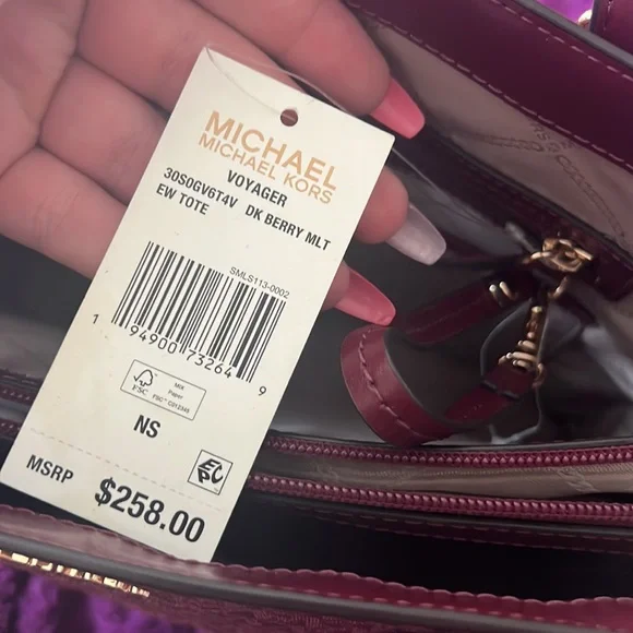Gently used MK purse. Real from the Michael Kors store at Lexington Mall.